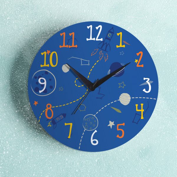 Big beautiful clock hanging on color background, space for text